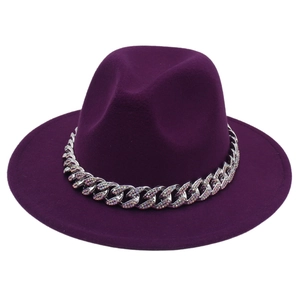 Detailed view of dark purple fedora hat with sparkling rhinestone encrusted silver chain