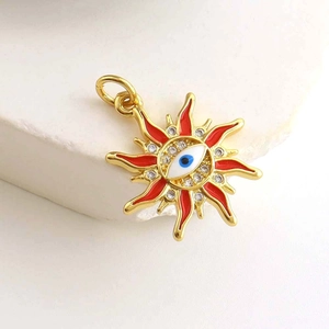 Gold-plated sun evil eye pendant with red enamel and micro-pave cubic zirconia