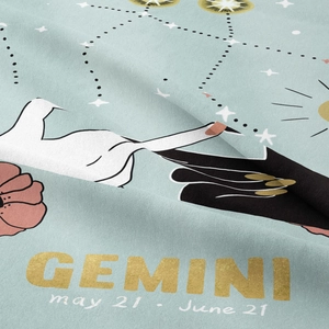 Detailed close-up of Gemini zodiac tapestry fabric showing intricate print and soft texture