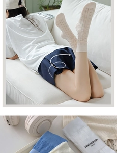 Detail of sweet bow-accented crew socks with hollow knit texture in beige and light blue