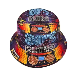 Retro 80s party themed reversible bucket hat featuring colorful cassette and disco patterns