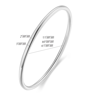 Detail showing 2mm and 3mm minimalist polished silver bangles in various inner diameters