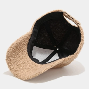 Khaki faux shearling baseball cap with fleece texture and adjustable strap for winter