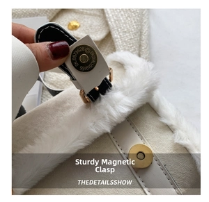 Detailed close-up of a golden magnetic snap closure on a beige plush cylinder bag