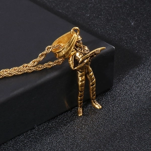 Detailed view of a gold shooting soldier pendant with a twisted rope chain necklace