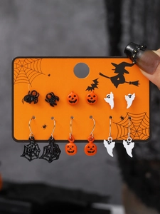 Detail of 6-pair Halloween earring set featuring spiders, pumpkins, and ghosts on a card