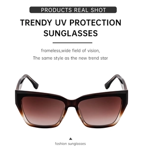 Detail view of cat eye sunglasses with dark brown gradient lenses and UV protection