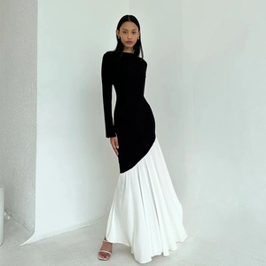 Elegant long sleeve patchwork maxi dress in black and white with pleated slim fit design