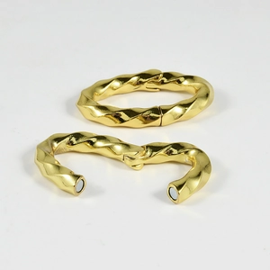 Detail showing gold twisted magnetic jewelry clasps for DIY accessories in closed and open states
