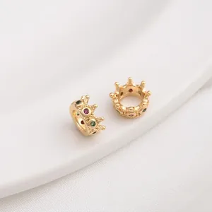 Detailed close-up of 14K gold plated crown beads with colorful zircon inlay for DIY jewelry