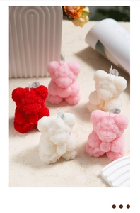 Set of five rose-textured bear scented candles in red, pink, and white for home decor