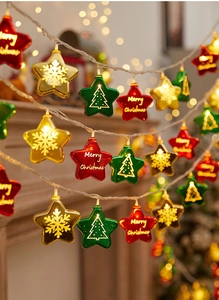 Festive Christmas star string lights with red, green and gold LED ornaments for decor.