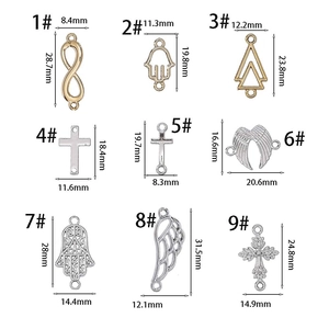Detailed size chart for vintage metal cross and angel wing charms in gold and silver