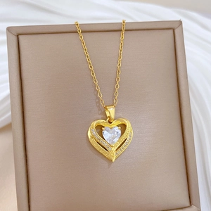Golden double-layered heart necklace with sparkling crystals and forever engraving
