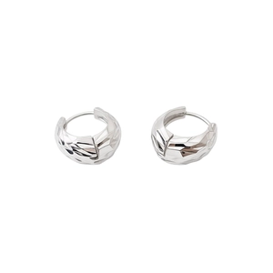 Minimalist silver pleated U-shaped hoop earrings with geometric faceted metal texture