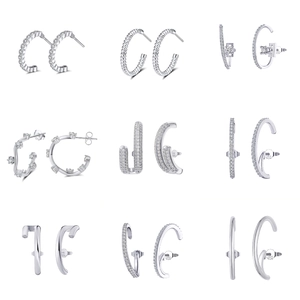 Collection of nine S925 sterling silver earrings with geometric and zircon designs