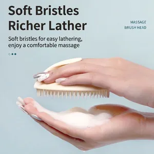 Beige round hollow scalp massage brush generating rich lather for hair washing
