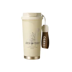 316 stainless steel lily of the valley coffee mug with carry strap in cream yellow finish