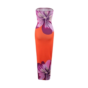 Detailed close-up of vibrant orange strapless maxi dress with purple floral print pattern
