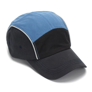Detail of five-panel camper cap showing sky blue and navy panels with grey reflective piping