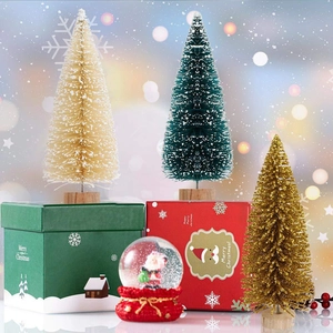 Miniature Christmas trees set with snow globes and gift boxes for festive home decoration
