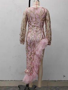 Detailed back view of pink evening gown featuring golden leaf sequins and mesh ruffles