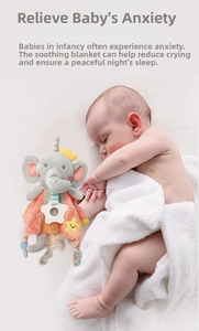 Close-up of elephant baby comforter with star-shaped teether and soft bean velvet texture
