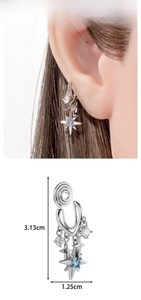 Close-up of silver star ear cuff with blue crystal and size measurements 3.13cm