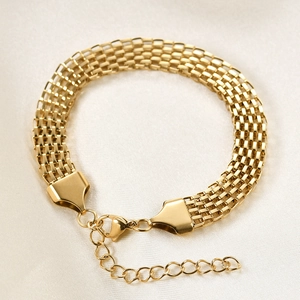 Minimalist 18K gold 8mm braided mesh chain bracelet with lobster clasp on silk
