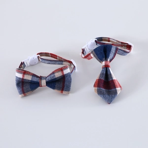 Detail of adjustable British plaid pet bow tie and necktie set with secure buckle