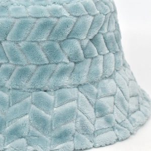 Close-up of light blue plush bucket hat showing detailed soft woven faux fur texture