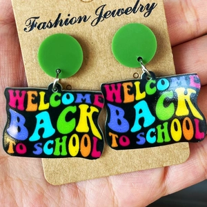 Colorful Welcome Back to School drop earrings with green studs and black acrylic pendants