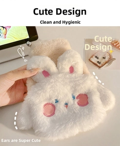 Close-up of cute plush bunny hot water bottle with soft white faux fur and pink embroidery