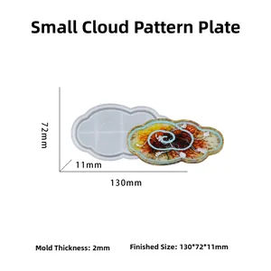 Macro detail of cloud-shaped silicone mold showing flexible texture and resin tray result