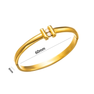 Gold plated titanium steel open bangle with white zircons, 60mm diameter and 6mm width