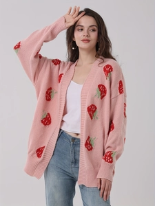 Chic pink strawberry knit cardigan with loose long sleeves and cozy aesthetic for women