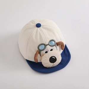 Corduroy baby baseball cap with cartoon puppy design and embroidery in beige and blue
