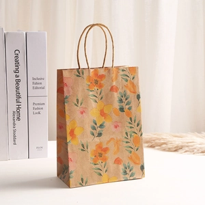 Brown kraft paper gift bag featuring vintage orange floral prints and rope handles