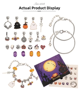 Detail view of Halloween DIY charm bracelet kit with ghosts, pumpkins and purple gift box