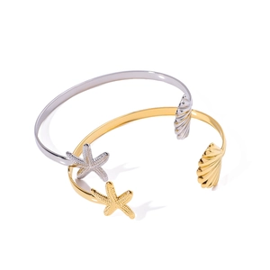 Starfish and shell open cuff bracelets in gold and silver finish on white background