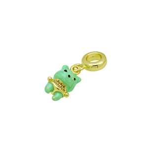 Detailed view of a green teddy bear pendant in gold-plated brass with crystals