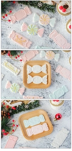 Macro detail of Christmas candy-shaped fondant molds with Merry Christmas embossing