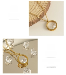 Detailed macro view of 18K gold plated stainless steel necklace with clear zircon heart
