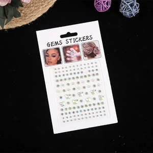 Iridescent facial gem stickers set with stars and butterflies for makeup art