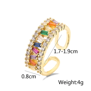 Detailed view showing the width and adjustable opening of the gold rainbow zircon ring