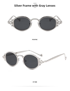 Detail view of silver oval sunglasses with grey lenses and baroque cross carvings