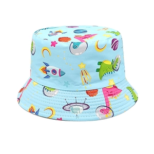 Detailed pattern of cartoon dinosaurs and space elements on a light blue kids bucket hat