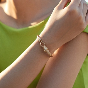 Elegant gold plated snake bracelet with sparkling crystals for a luxury fashion look