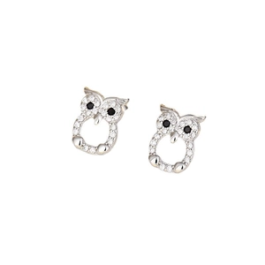 Silver owl stud earrings with sparkling white crystals and black stone eyes