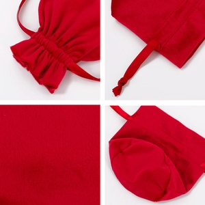 Detailed views of red velvet drawstring pouches showing fabric texture and ribbon closure